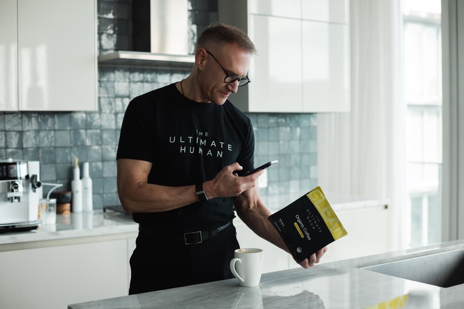 Gary Brecka scanning the QR code on a bag of The Ultimate Brew